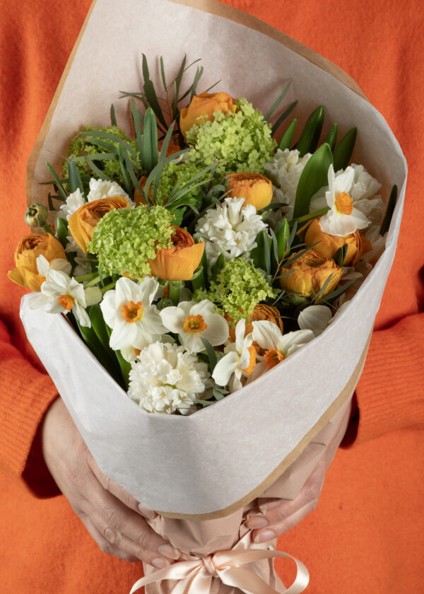 Close-up-of-Spring-bunch-in-orange-creams-and-greens